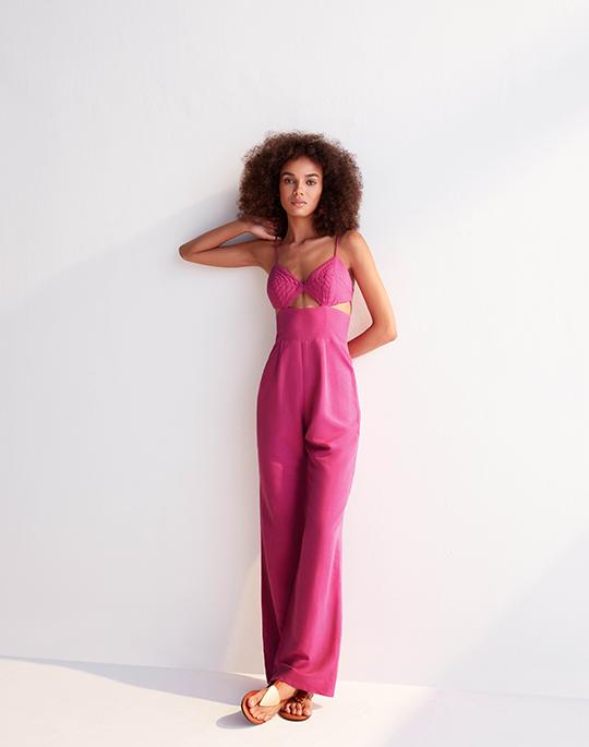 woman in pink jumpsuit