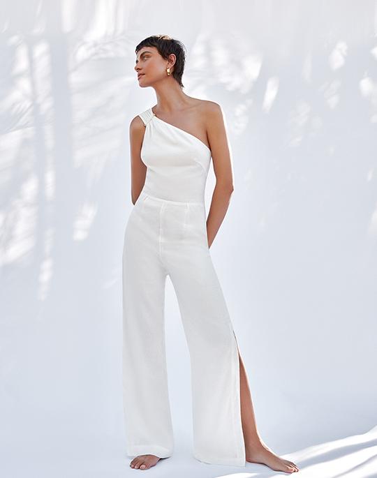 woman in white jumpsuit